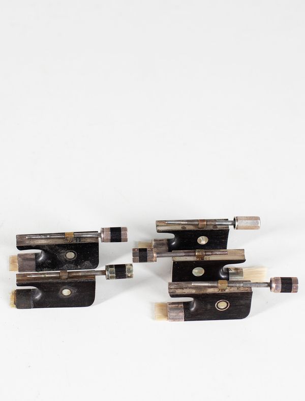 Five silver-mounted viola frogs