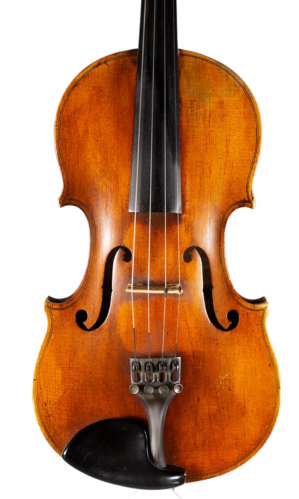 A violin, labelled d'apres A. Stradivarius