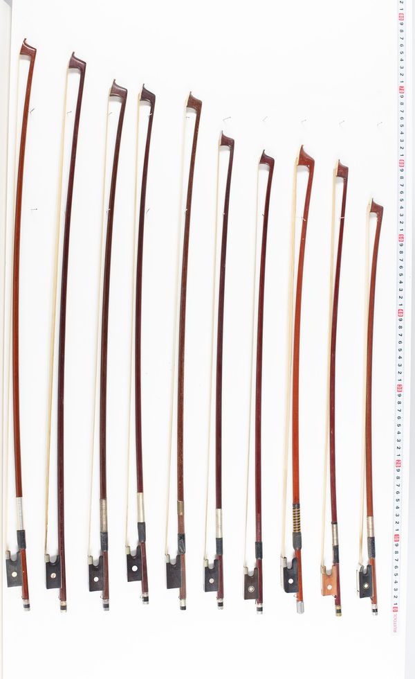 Eighteen violin bows and three cello bows, various lengths