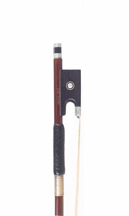 A nickel-mounted violin bow, branded Conrad Gotz