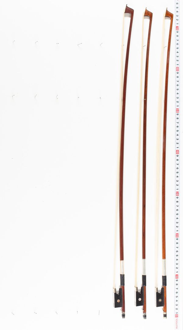 Three violin bows, various lengths