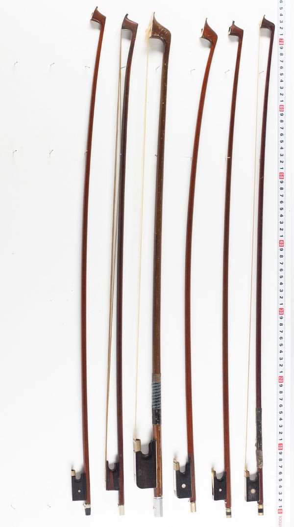 Four violin bows, one cello bow, one double bass bow, various lengths