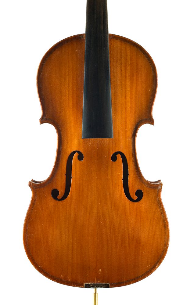 A half-sized violin, labelled Antonius Stradivarius Cremonensis