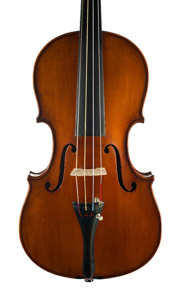 A three-quarter sized violin, labelled Japanese copy of Stradivarius Model