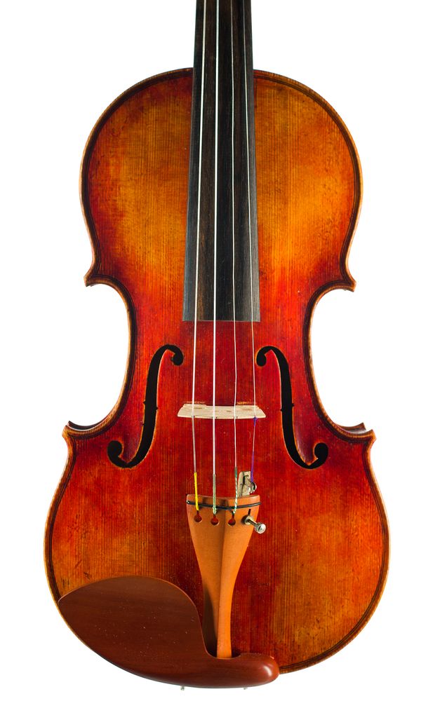 A violin labelled Andre Conot