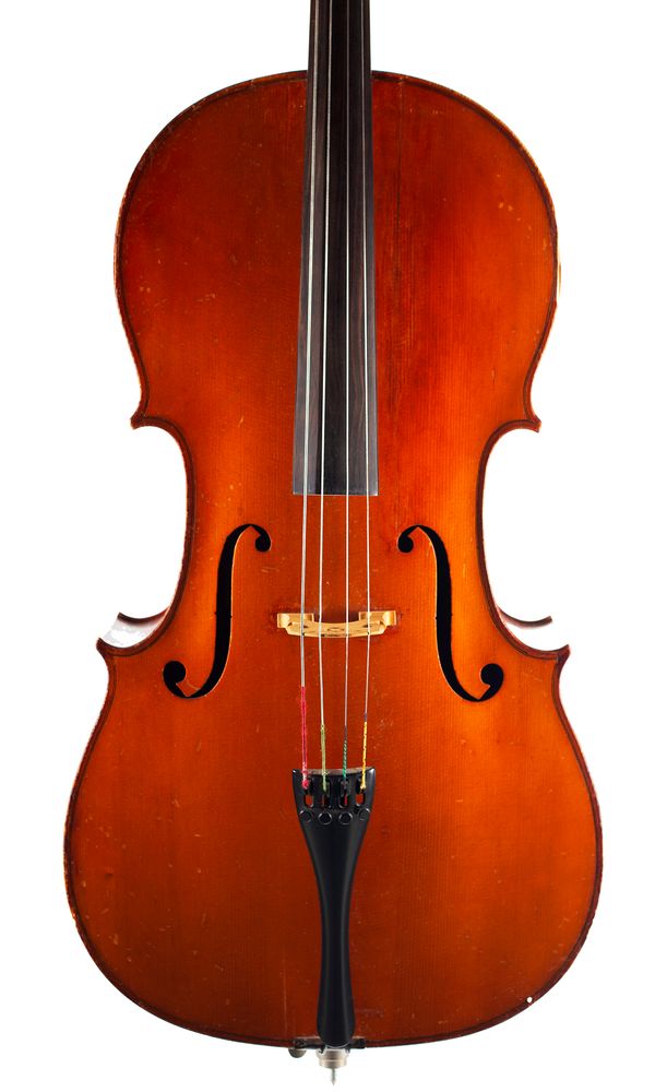 A cello, labelled M. Couturieux