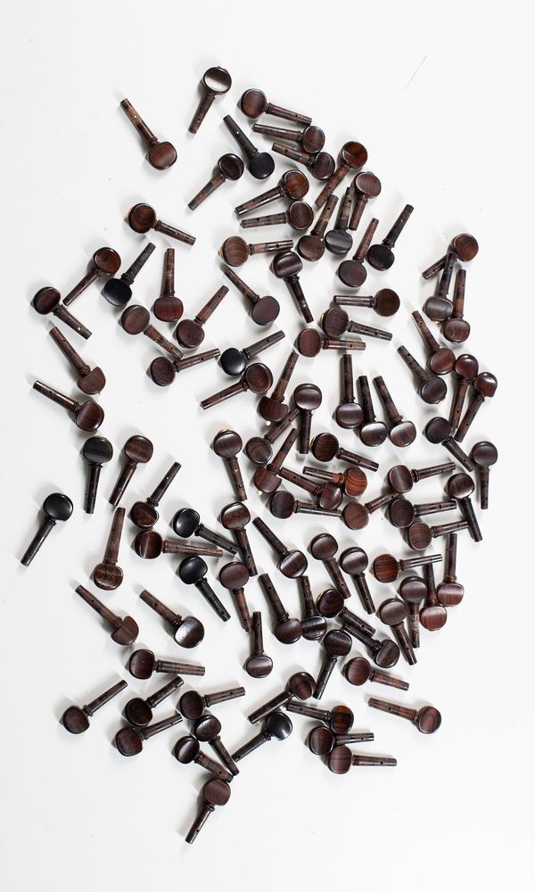 One hundred violin pegs, various sizes