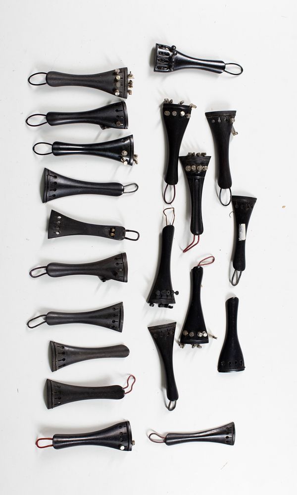 Twenty violin tailpieces