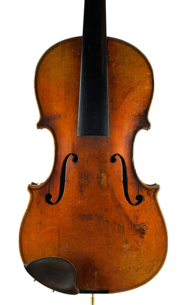 A violin, labelled Manufactured in Berlin