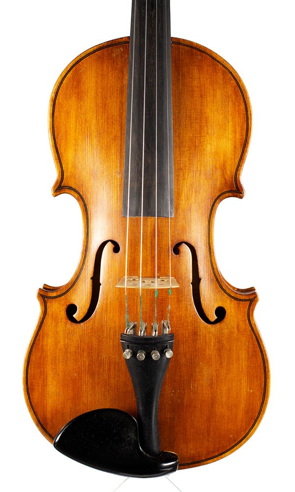 A violin, labelled Gustav Hausherr