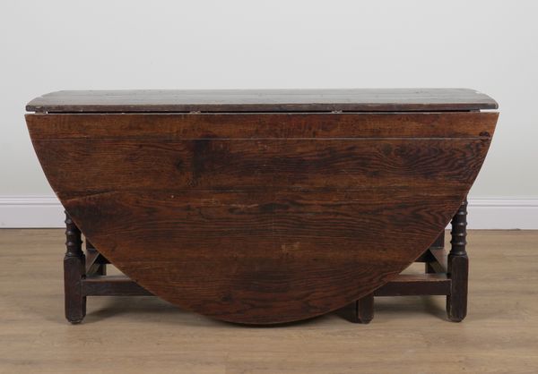 A 17TH CENTURY OAK GATE LEG TABLE