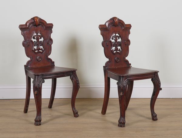 A PAIR OF VICTORIAN MAHOGANY HALL CHAIRS (2)