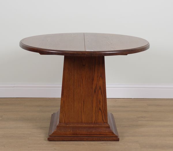 AN ART DECO STYLE OAK CIRCULAR CENTRE TABLE