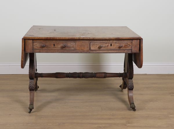 A REGENCY ROSEWOOD BANDED MAHOGANY TWO DRAWER SOFA TABLE