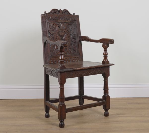 A 17TH CENTURY STYLE OAK WAINSCOT ARMCHAIR