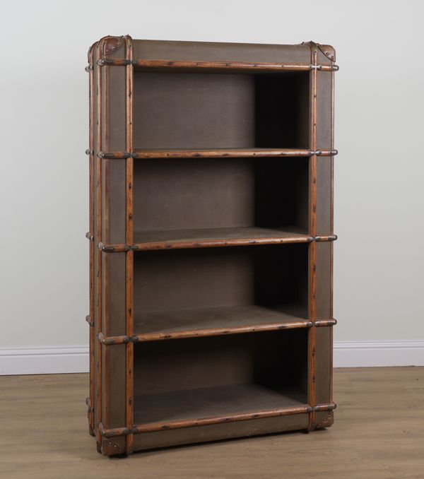 A 20TH CENTURY FOUR TIER STEAMER TRUNK FLOOR STANDING OPEN BOOKCASE