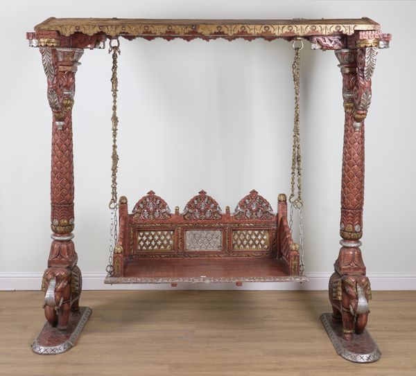 A RED LACQUER POLYCHROME DECORATED CARVED SWING BENCH