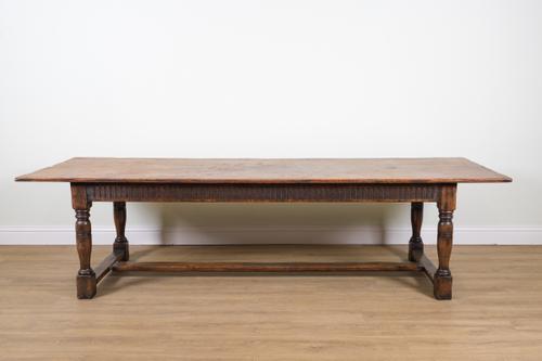 A 17TH CENTURY STYLE OAK PLANK TOP REFECTORY TABLE