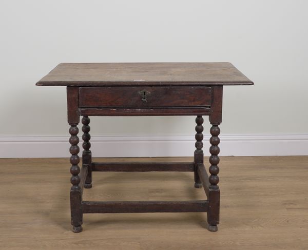 A 17TH CENTURY OAK SINGLE DRAWER SIDE TABLE