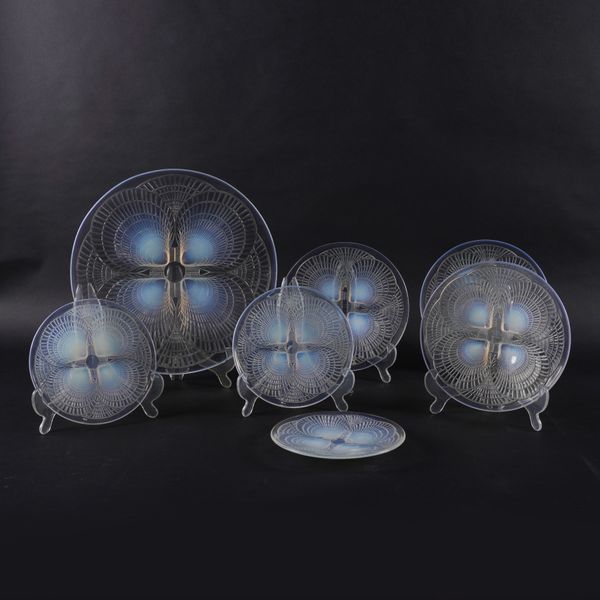 SEVEN LALIQUE `COQUILLES' CLEAR AND OPALESCENT GLASS PLATES (7)