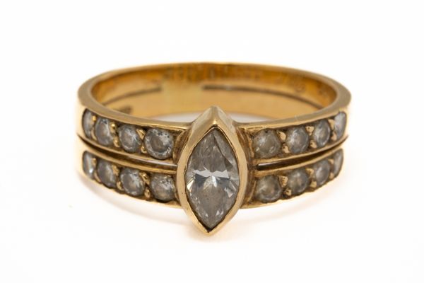 AN 18CT GOLD AND DIAMOND RING