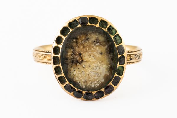 A GEORGIAN GOLD MOURNING RING