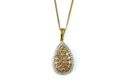 A 9CT GOLD AND DIAMOND SET PENDANT WITH A SILVER GILT NECKCHAIN (2)