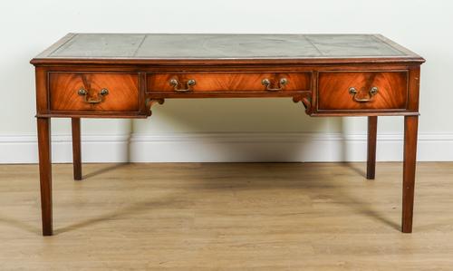 AN 18TH CENTURY STYLE MAHOGANY THREE DRAWER WRITING DESK (2)