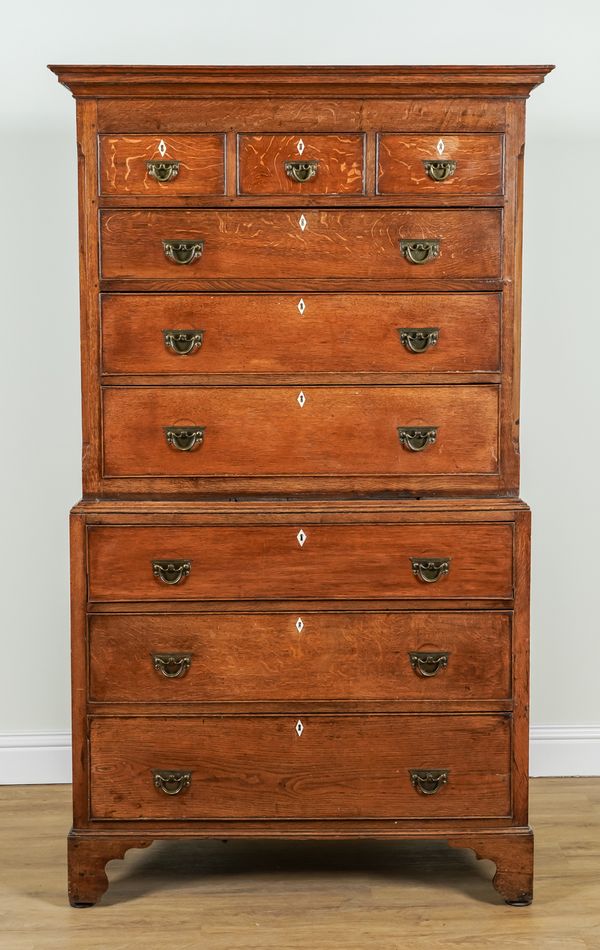 A GEORGE III OAK NINE DRAWER CHEST-ON-CHEST