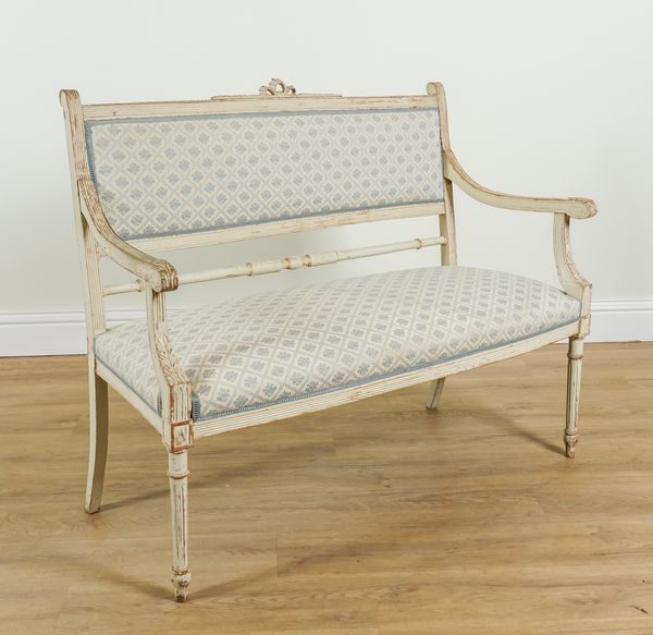 A LOUIS XVI STYLE WHITE PAINTED TWO SEAT SOFA