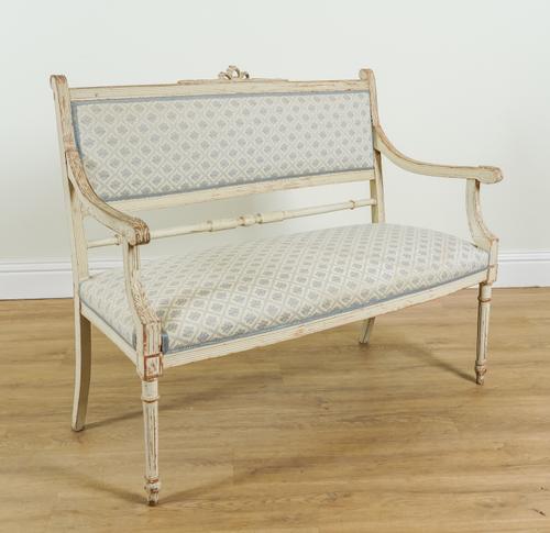 A LOUIS XVI STYLE WHITE PAINTED TWO SEAT SOFA