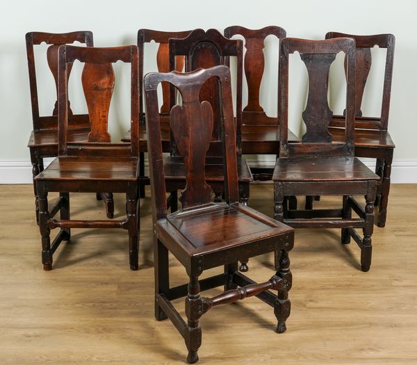 A COMPOSITE SET OF EIGHT LATE 17TH AND EARLY 18TH CENTURY OAK DINING CHAIRS (8)