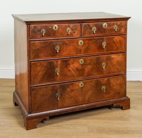 A GEORGE II FIGURED WALNUT FIVE DRAWER CHEST