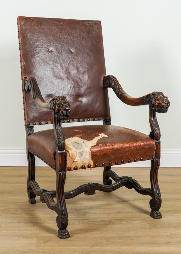 A 19TH CENTURY CONTINENTAL WALNUT FRAMED SQUARE BACK OPEN ARM CHAIR