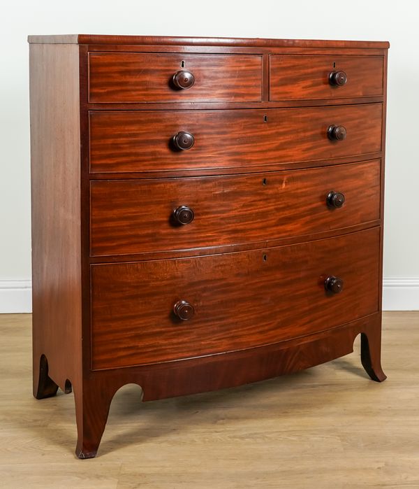 A REGENCY MAHOGANY BOWFRONT FIVE DRAWER CHEST