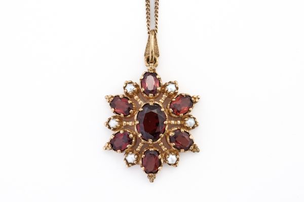 A GOLD, GARNET AND HALF PEARL SET HEXAGONAL PENDANT, WITH A 9CT GOLD NECKCHAIN (2)