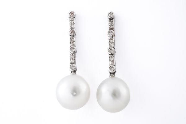 A PAIR OF CULTURED PEARL AND DIAMOND PENDANT EARRINGS