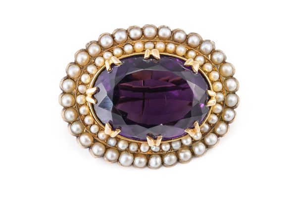 A VICTORIAN GOLD, AMETHYST AND HALF PEARL SET OVAL BROOCH