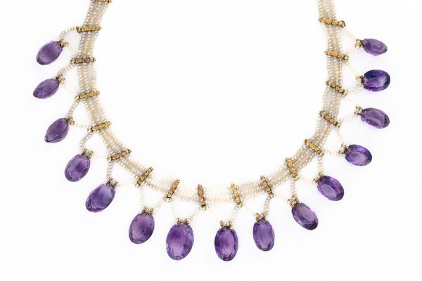 AN AMETHYST AND SEED PEARL GRADUATED COLLAR NECKLACE