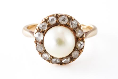 A GOLD, CULTURED PEARL AND DIAMOND CLUSTER RING