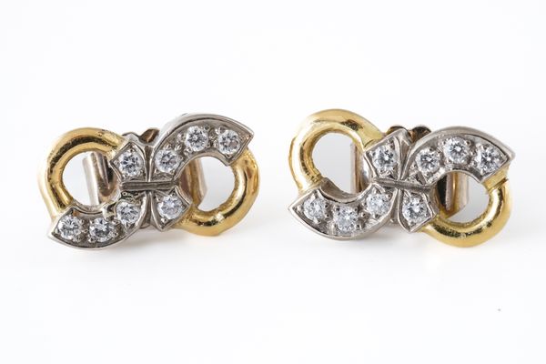 A PAIR OF GOLD AND DIAMOND EARSTUDS