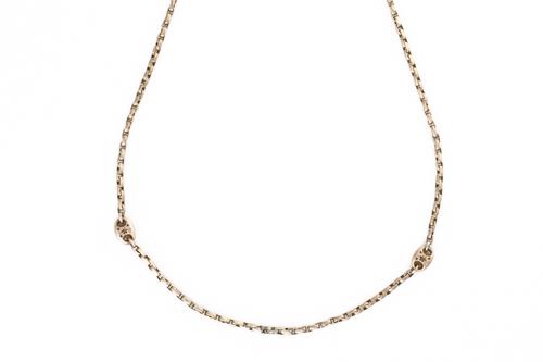 A LATE VICTORIAN GOLD LONG GUARD CHAIN