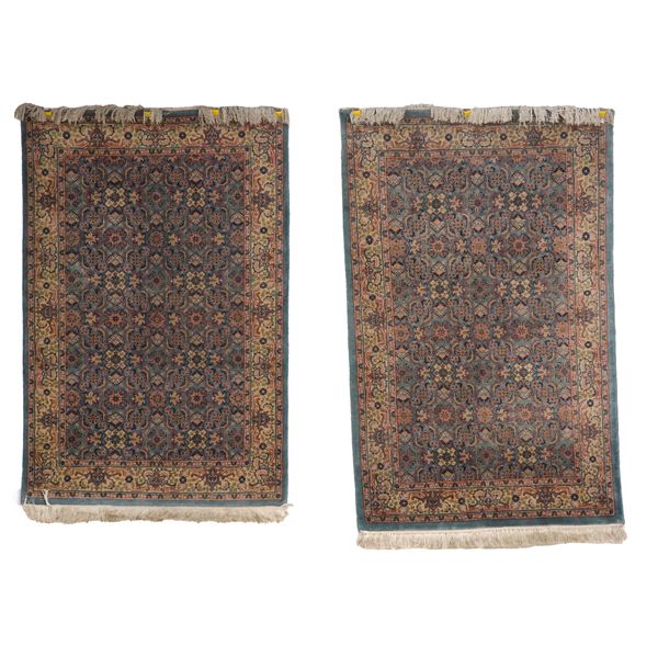 A PAIR OF SAROUGH RUGS (2)