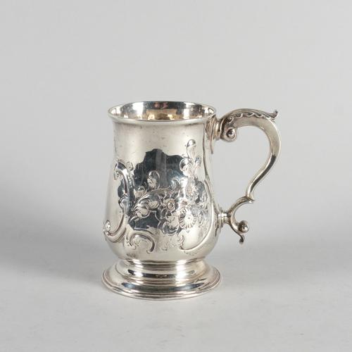 AN EARLY GEORGE III SILVER MUG