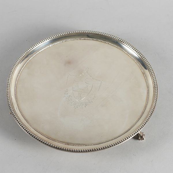 A GEORGE III SILVER CIRCULAR SALVER