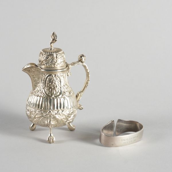 A GEORG JENSEN NAPKIN RING AND A DUTCH LIDDED CREAM POT (2)