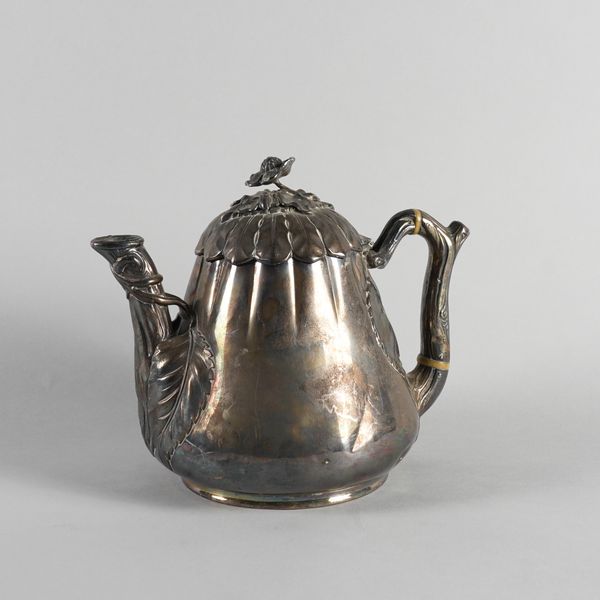 A VICTORIAN SILVER TEAPOT