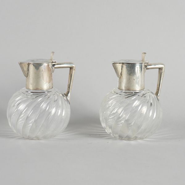 A PAIR OF GERMAN LIQUEUR JUGS (2)