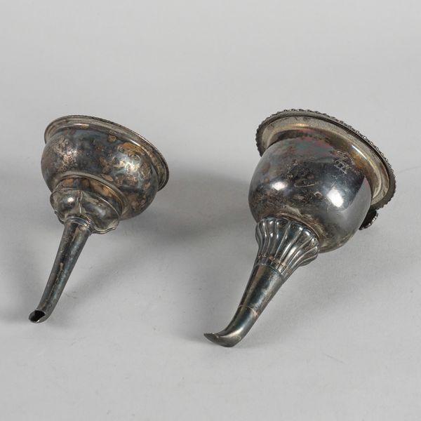 TWO SILVER WINE FUNNELS (2)