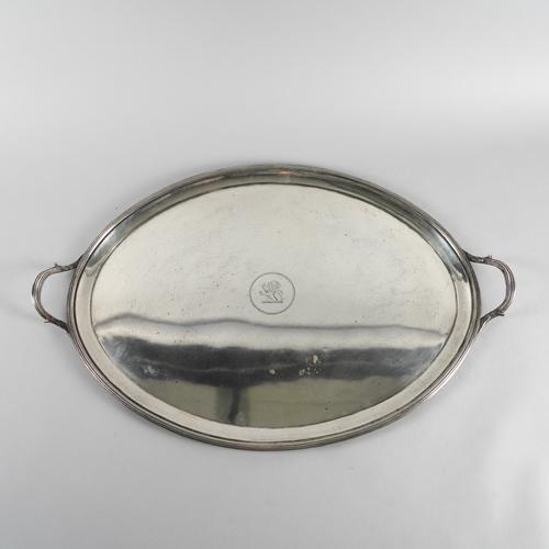 A SILVER LARGE OVAL TWIN HANDLED TRAY